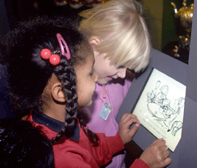 Figure 2: Children watching a short ingallery video loop